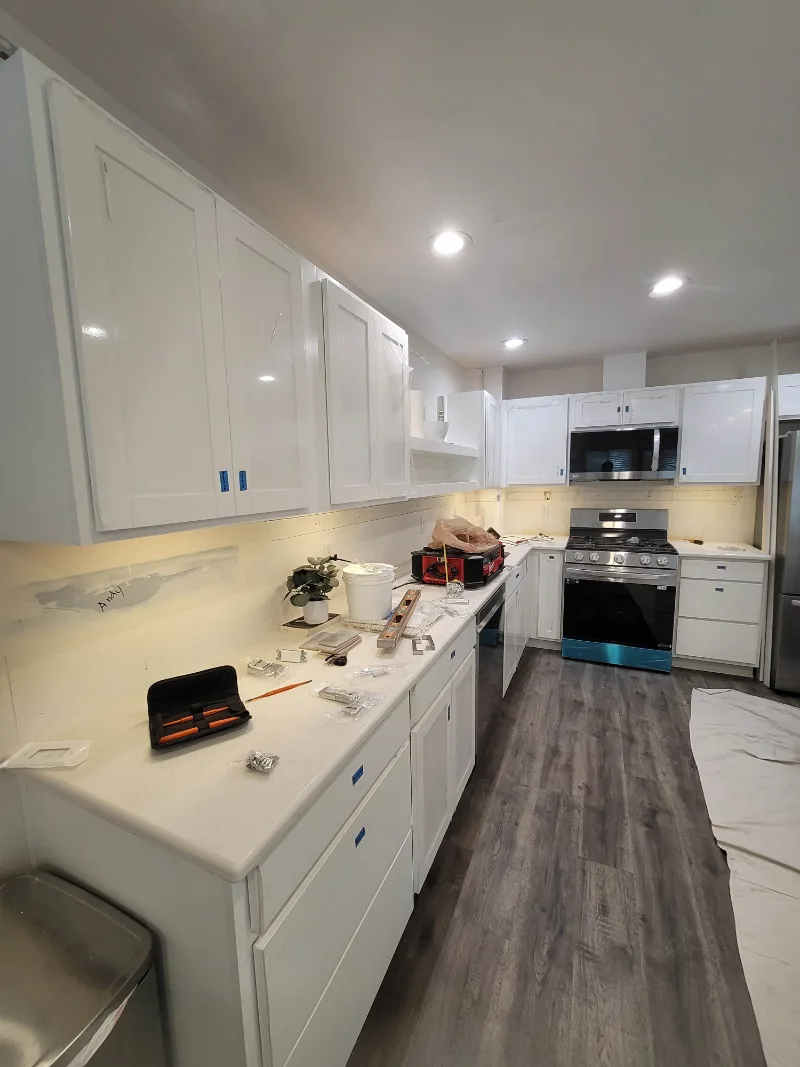 Kitchen during the remodel: new flooring and appliances in place