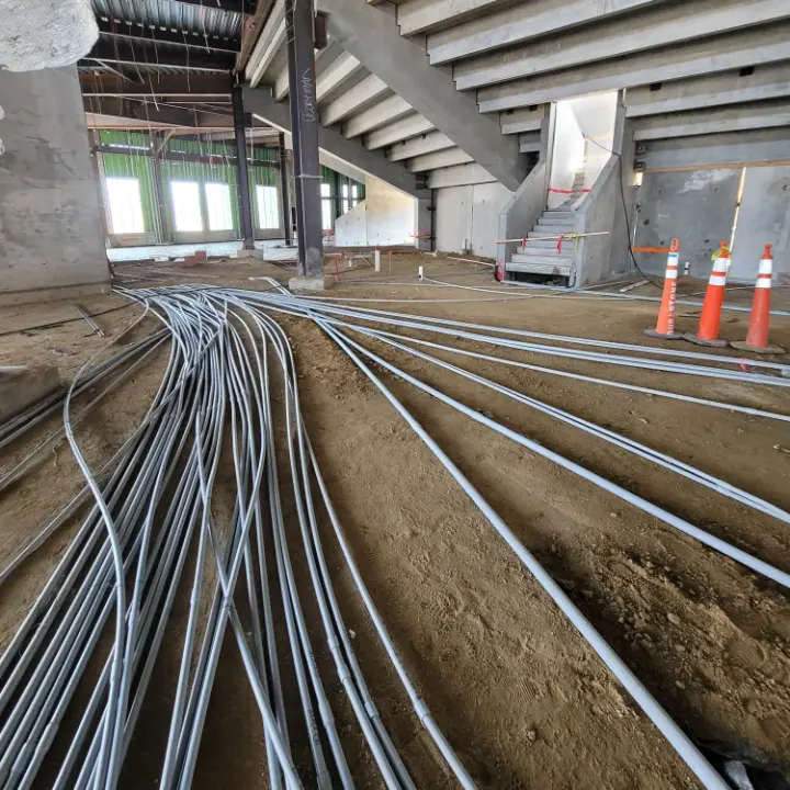 Electrical conduit runs laid out before a slab pour