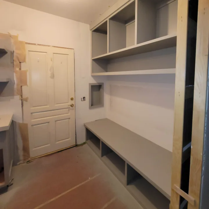 Entry room with new built-in bench and shelving
