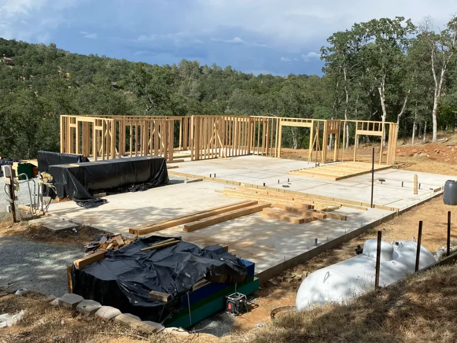 Progress photo: slab poured and the first walls framed